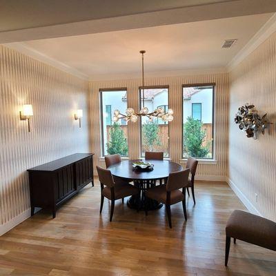 Dining room wallpaper installation.