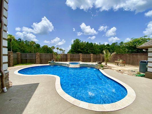 Lumberton pool with raised hot tub, sheer descents and water pots