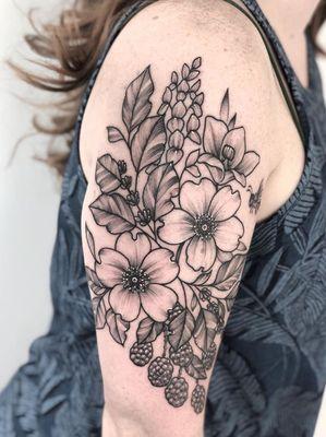 Black and grey linework flowers tattoo by Amanda Creek in Bellingham Washington.