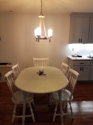 Installed new dining room hanging fixture and installed dimmer switch.