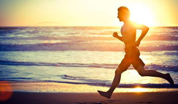 Man running on beach