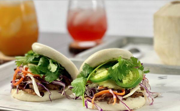 Steam bao bun, pickled carrots, jalapeno, cucumber, purple cabbage served with our signature house sauce with grilled pork.