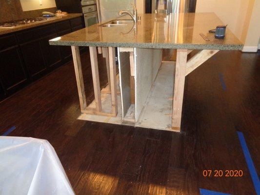 Kitchen Island after pullout with counter top support - to give access to the flooring