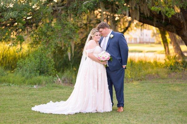 Bride and groom embracing at Pawleys Plantation