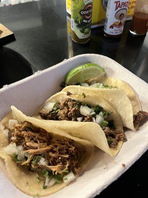 (1) Carnitas and (2) steak tacos