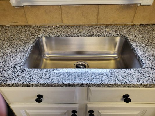 New deep stainless sink to go with these fabulous countertops