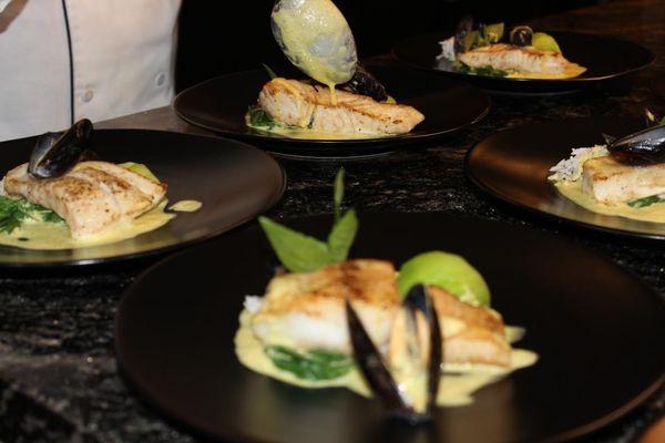 Halibut in Spicy Curry Sauce with Baked Mussels and Bok Choy Le Delice Catering