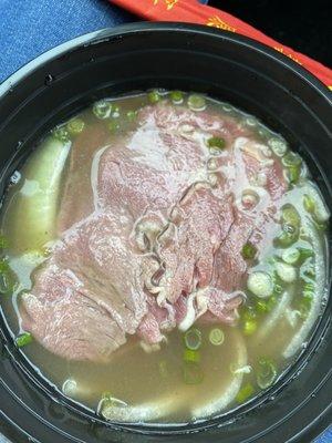 P1. "Classic Pho noodle soup" to-go --with rare eye round beef, rice noodles, broth, onions, scallions, etc.