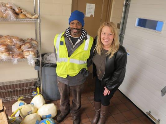 Elhart employees donate turkeys to the Holland City Mission