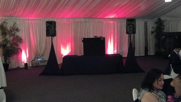 Desert Music Entertainment's equipment set-up with red accent lighting