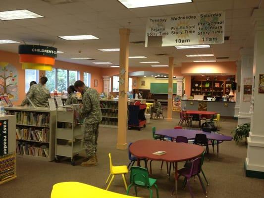 Children's center. Children books, arts and crafts. Here Army OCS candidates are preparing to read to the children!