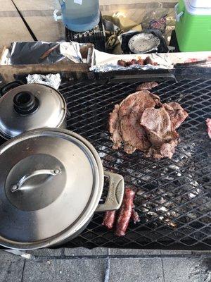 Carne asada and chorizo on charcoal