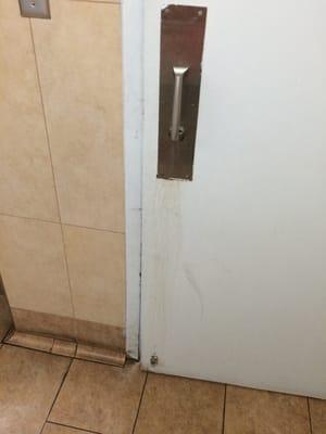 Women's bathroom door