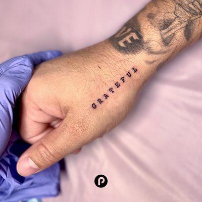 Type font tattoo