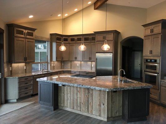 Wine Country Kitchen.  Large Island, Smoke stain finish with a Java aisland finish on Hickory.