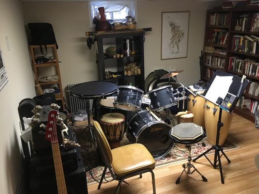 The studio space- lots of instruments to try out and a bass for play-along!