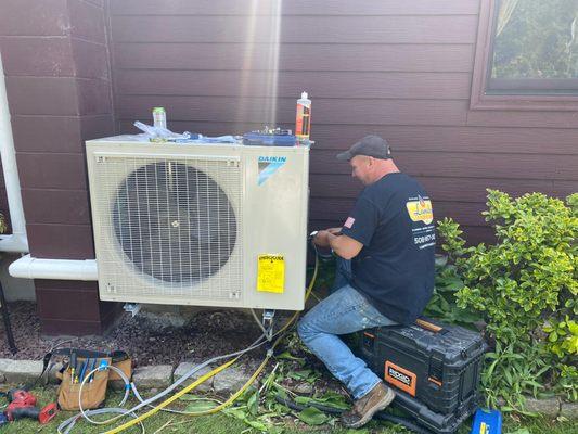 One of our Background Checked and Skilled HVAC Installers hard at work. Need heating/cooling for your home? "Just Call Landry"