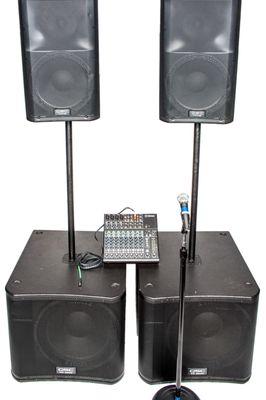 A self-powered QSC system with two subs for twice the low end energy.  Great for a live DJ.