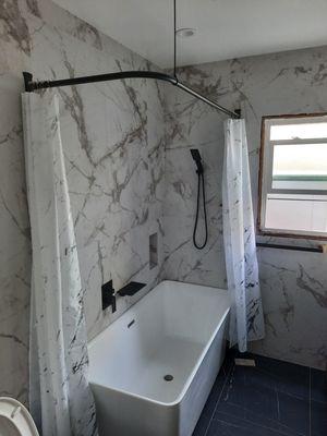 Bathroom renovation, Installation of bathtub, faucet