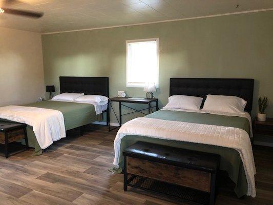 Our newly remodeled rooms feature hardwood floors, new mattresses, and flat screen televisions. All rooms have a private entrance.