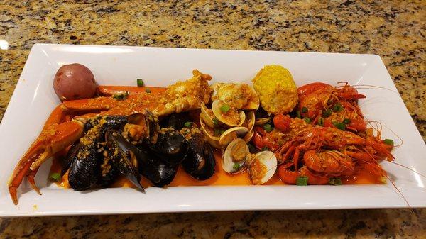 New addition to the menu, sampler platters, snow crab, mussels, clams, and fresh CRAWFISH