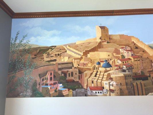 There is a fascinating mural painted inside of Mar Saba Olive Oil's tasting room that pays homage to St. Saba Monestery in Palestine.