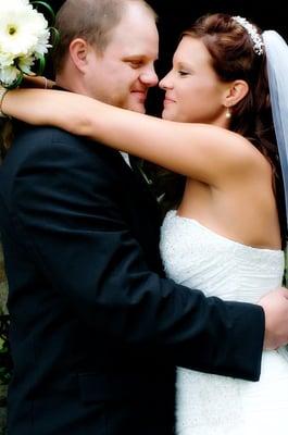 Intimate moment between bride and groom