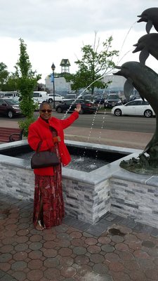 Wifey by the wishing well dolphin fountain on the docks on Woodcliff Avenue