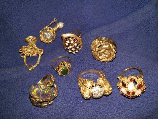 6 14k gold rings diamond rubys and precious stones included. Two 14k charms