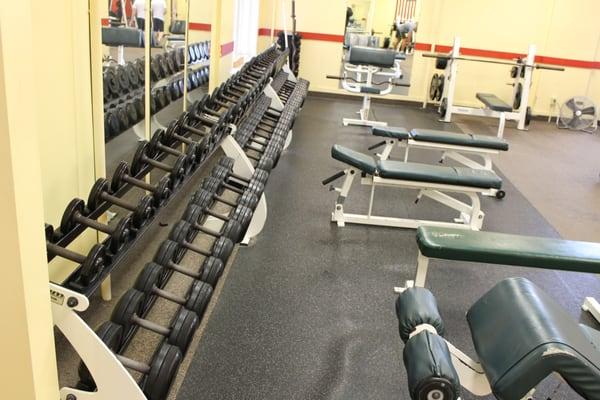 Free Weights and some of our many benches in the Weight Room