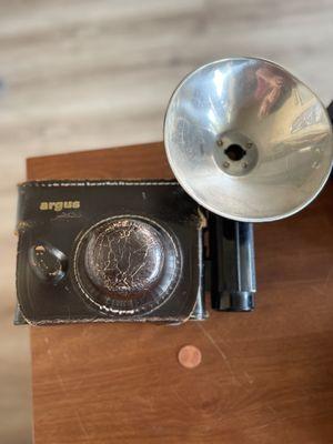 Vintage Argus camera with leather case.