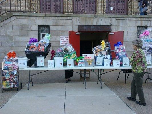 Gift baskets to be raffled off. Look for them after masses and next weekend at Millvale Community Days. And yes, you DID  see beer there!