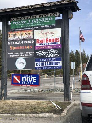 Wednesday, April 3, 2019: plaza sign showing Kingsbury Coin Laundry.