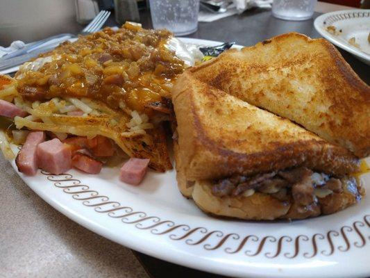 Texas patty melt with loaded hash browns.