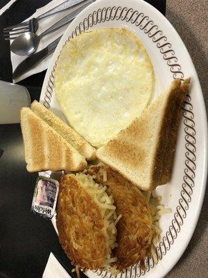 Two egg breakfast with large hash browns and a drink $5