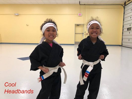 We just earned our headbands at DeAngelis Martial Arts!