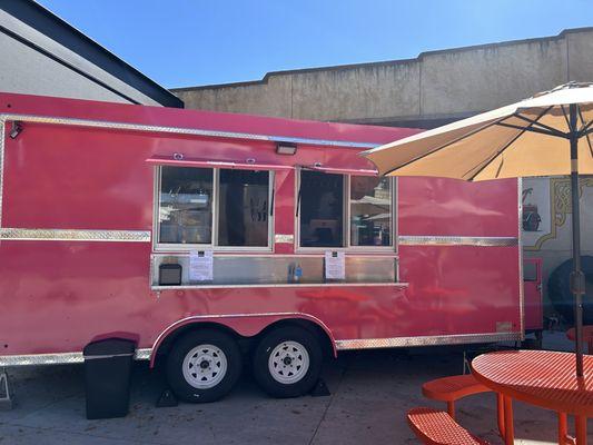 The pink food truck that is Bunny Chow!