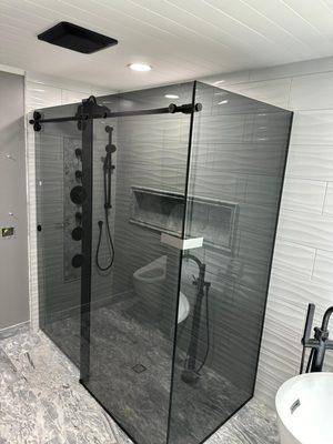 Black Glass with Black hardware sliding shower