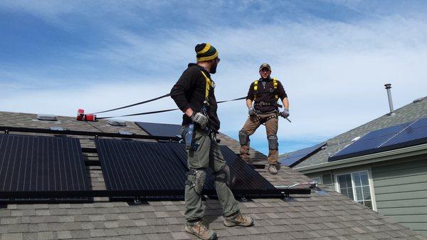 The crew installing a residential solar system.