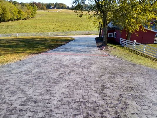 Stamped Roman cobble with coal intergal color