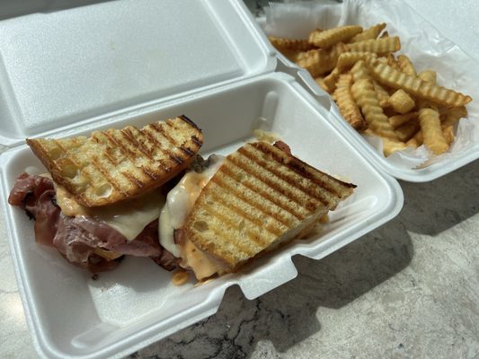 Pastrami Sandwich and Fries as they came to go.