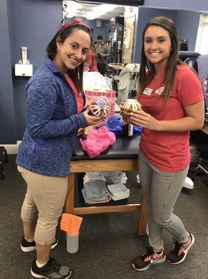 Mak and Caroline my awesome Physical Therapists,  happy to receive their Valentines Bundt cakes and . . ?