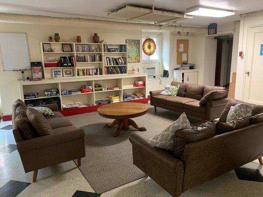 Lounge area with games, books and TV/DVD player.