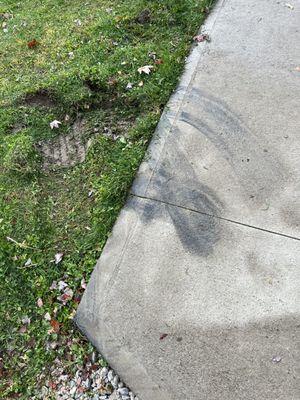 Discoloration to sidewalk.