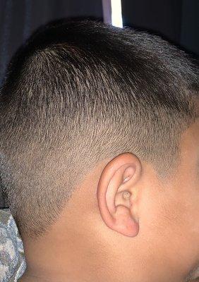 My sons fresh haircut by Pati, high fade trim on top