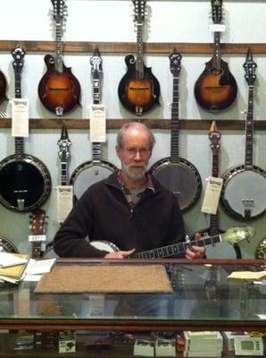 Shop owner Tony Creamer playing some clawhammer banjo.