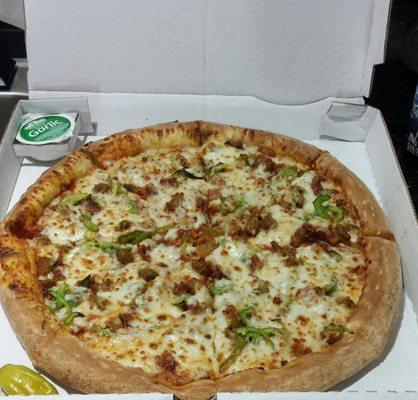 Large sausage green pepper pizza