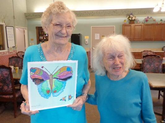 Residents enjoy art and music at the Courtyard