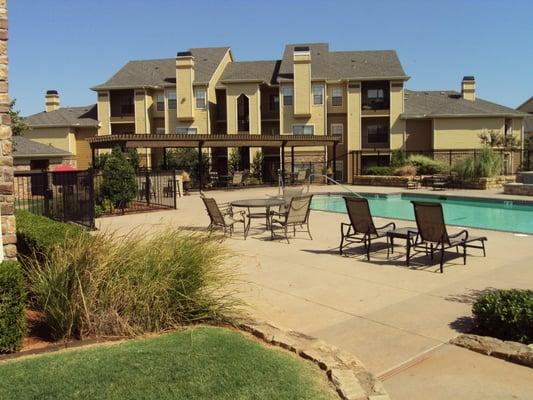 Relax Poolside at the Stoneleigh on May Apartments