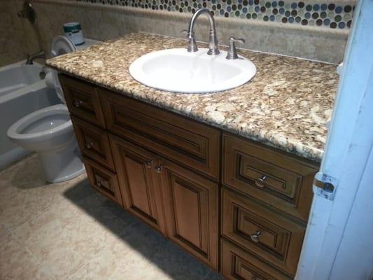 bathroom cabinets and granite sales and install .